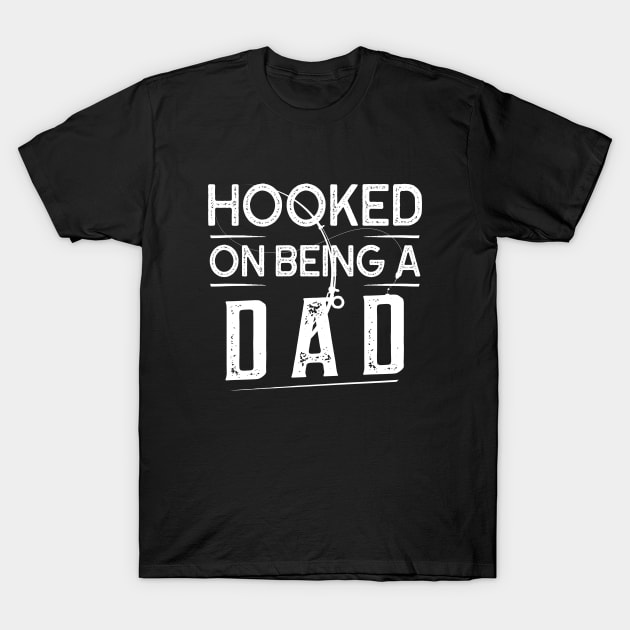 Hooked On Being A Dad T-Shirt by Sunil Belidon